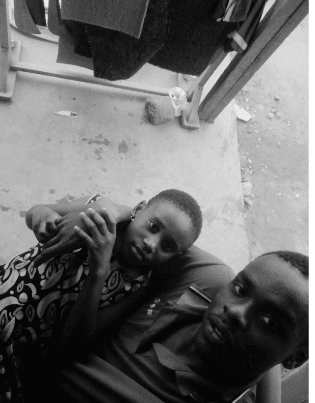 Samuel with family in Mpohor